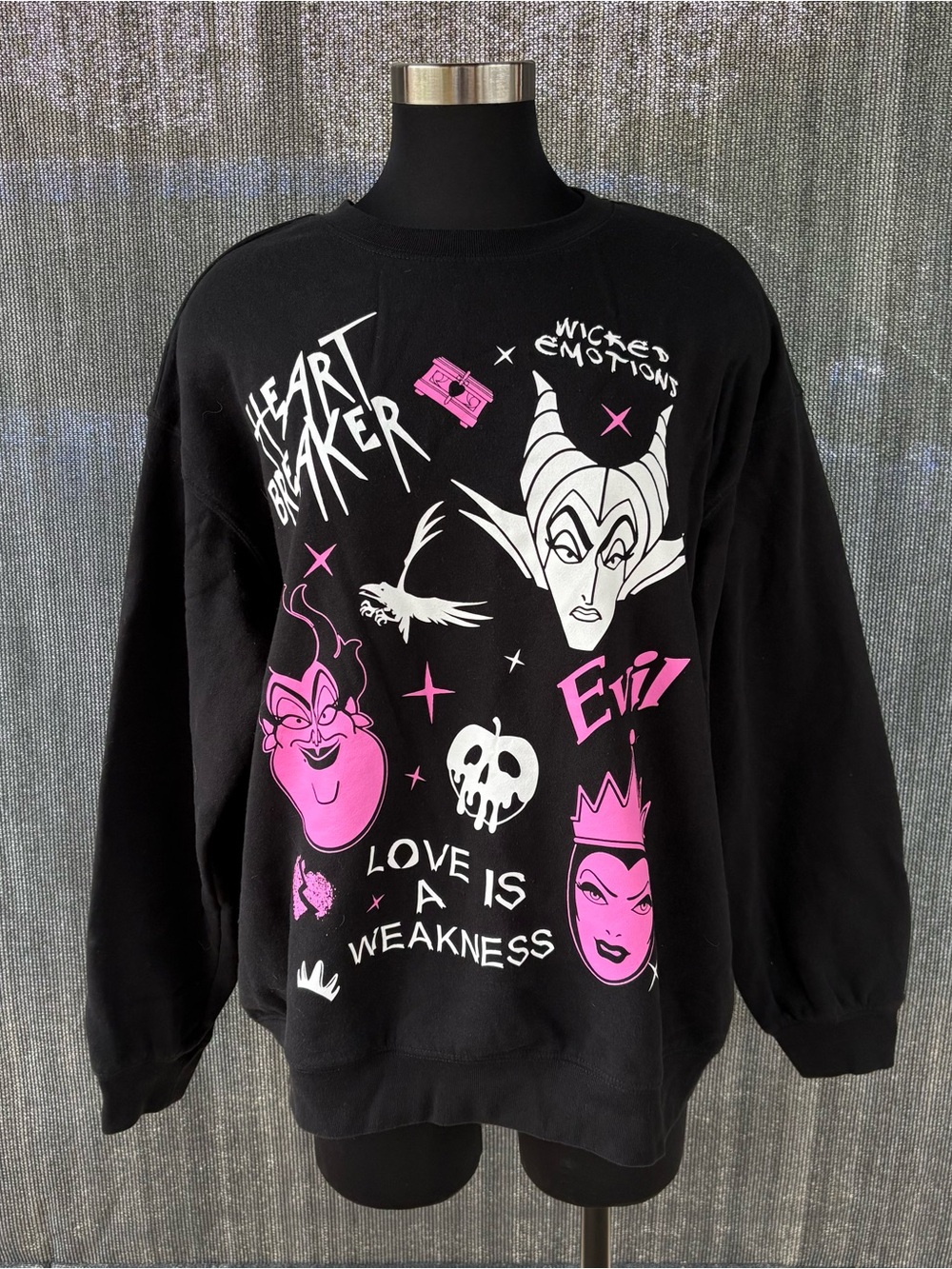 Disney Women's Black Crewneck Sweater with Pink & White Villain Graphics
